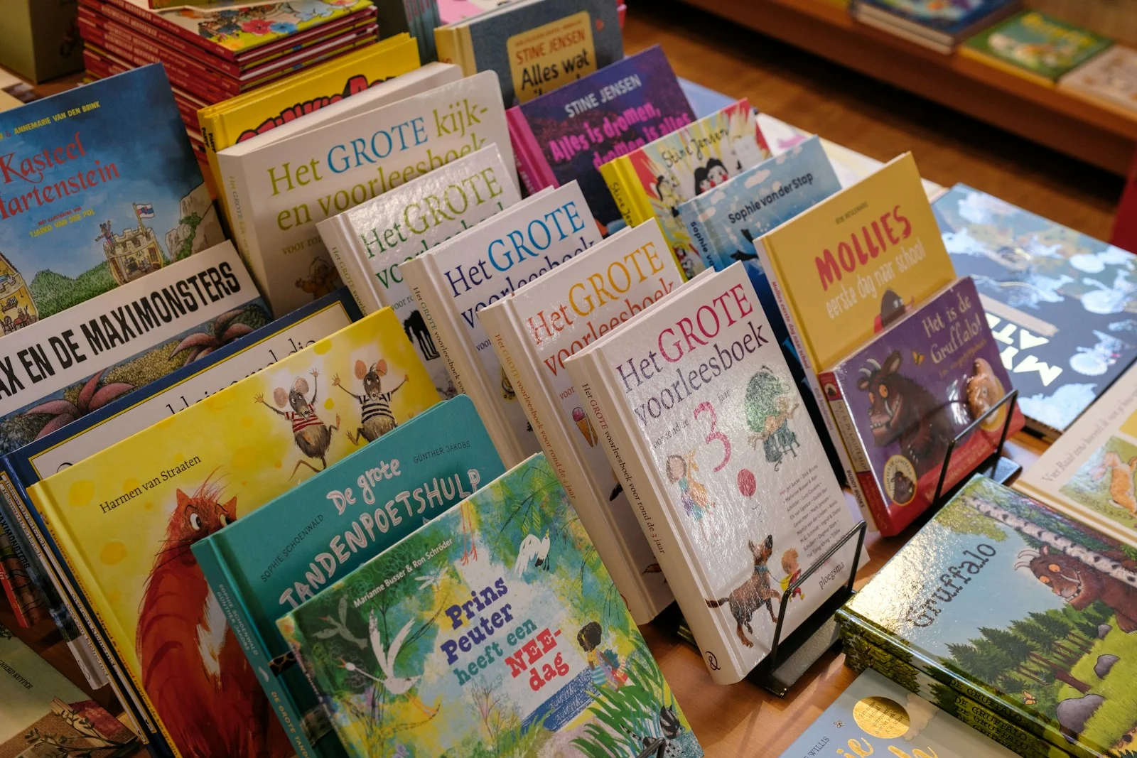Colorful children's books on a bookshop display