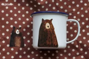 A hand-painted enamel mug